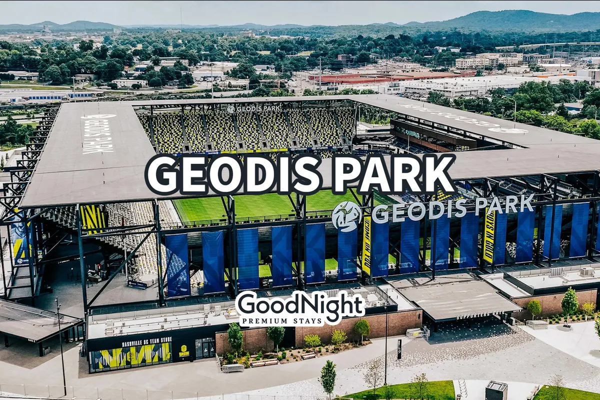 GEODIS Park stadium stands out against rolling hills, with vibrant signage and the suggestion of a crowd gathering for an event. The environment is charged with anticipation, suitable for both sports events and concerts.